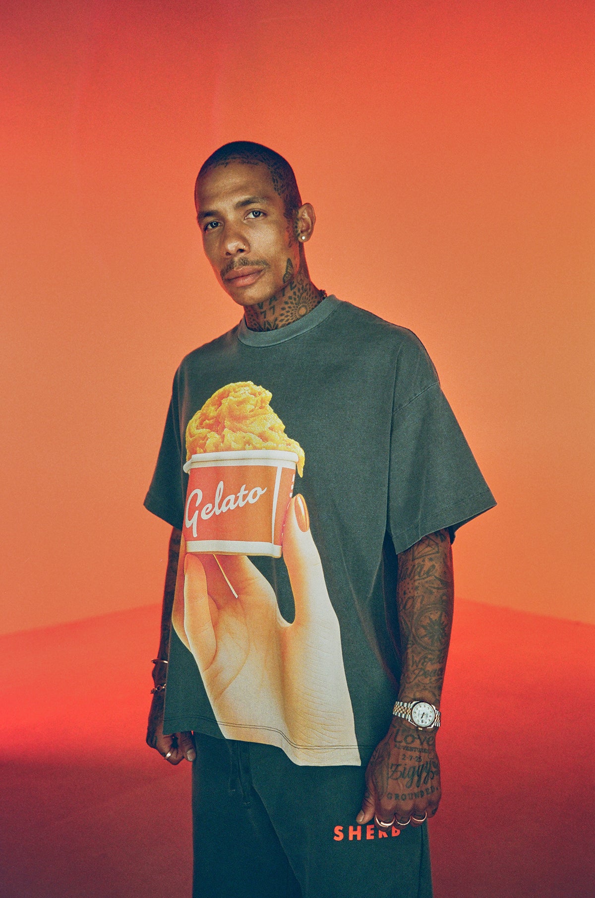 Gelato Cup tee and dark pants photographed on color film